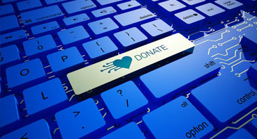 Tastatur mit blauen Tasten und einer weißen Taste "Donate"