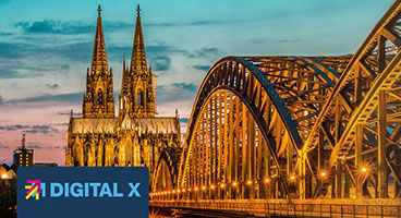 Cologne Cathedral at dusk with Digital X logo 
