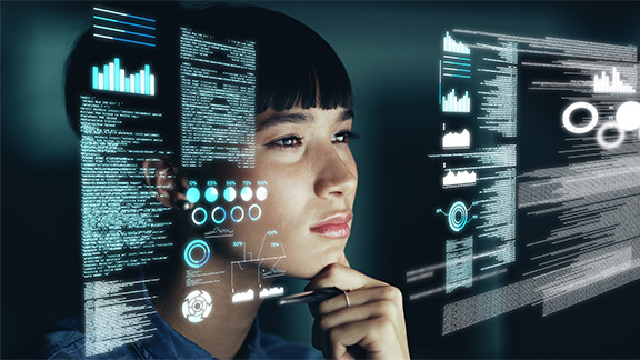 A woman looking pensively at two user interfaces