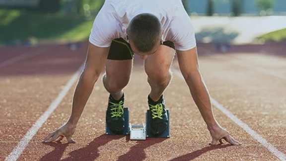 A sprinter waits for the starting signal